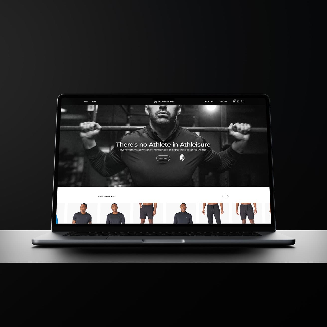 Left: laptop mockup showing the Greatness Wins e-commerce homepage. (1 of 2)