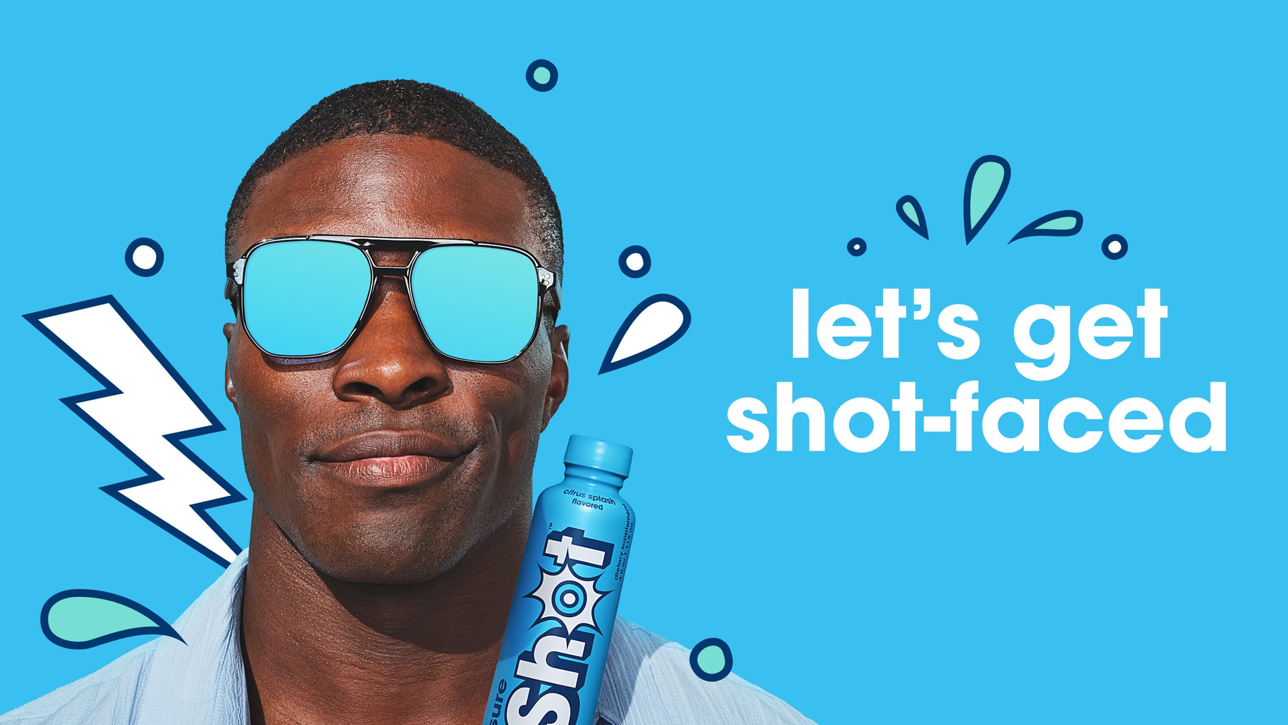 Full-width cyan lifestyle image of a man in sunglasses holding a Sure Shot bottle with comic-style lightning bolt and splash illustration… (1 of 3)